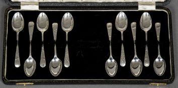 A matched set of ten silver coffee spoons, hallmarked Sheffield 1899 and 1921,