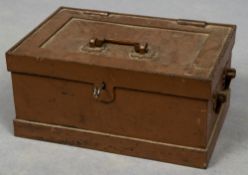A cast iron strong box, of typical form, with side and top handles. 45 cm wide.