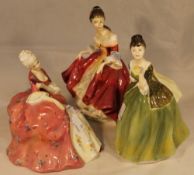 Three Royal Doulton figurines: Southern Belle; Wistful;