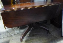 A Victorian mahogany pedestal Pembroke table