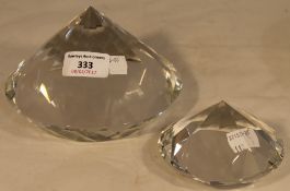 Two diamond form paperweights