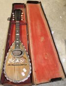 A mother-of-pearl inlaid mandolin,