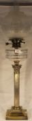 A Victorian silver plated columnar oil lamp