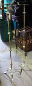 A pair of brass candle stands