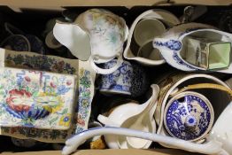 A box of miscellaneous decorative china