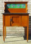 A Victorian marble top tiled back wash stand