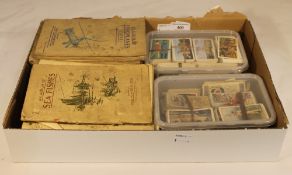 A collection of cigarette and tea cards