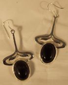 A pair of silver and amethyst earrings