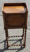 An oak barley twist pot cupboard