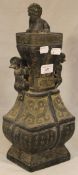 A Chinese cast twin handled vase and cover