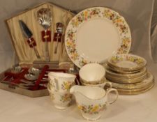 A tea set and a set of plated cutlery