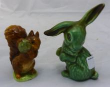 A Beswick Beatrix Potter figure together with a Sylvac rabbit,