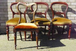 Three Victorian mahogany dining chairs and a rosewood dining chair