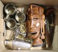 A quantity of African carvings, pewter,