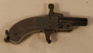 A miniature pistol form fob