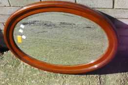 A walnut framed mirror