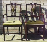 A pair of mahogany open armchairs