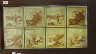 A framed set of eight printed glass tiles