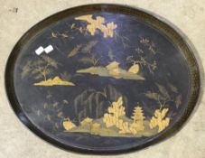 A lacquered papier mache tray