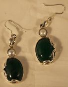 A pair of silver and jade earrings