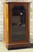 A Victorian inlaid walnut music cabinet