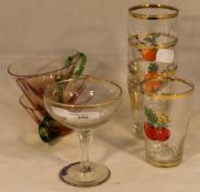 A quantity of Babycham and Britvic glasses and cranberry punch glasses