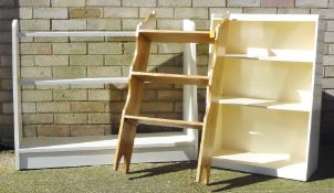 Two white painted bookcases and a pine hanging shelf