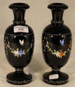 A pair of Victorian decorated glass vases