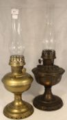 Two brass oil lamps