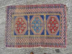 A Caucasian wool rug