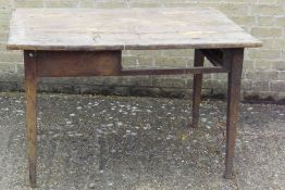 A small Victorian elm topped farmhouse table