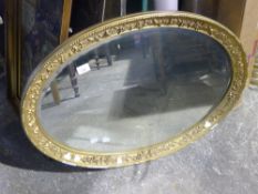 A gilt framed mirror