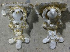 A pair of Victorian porcelain wall brackets