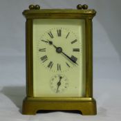 A brass cased carriage timepiece