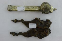 A 19th century Middle Eastern brass scribes case and a pair of Indian Betel nut cutters