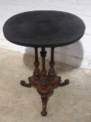 A 19th century walnut oval side table with cluster column base