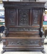 A 19th century carved box settle