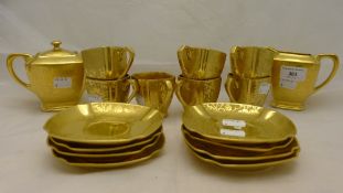 A gold porcelain tea set