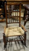 A 19th century ladder back rocking chair