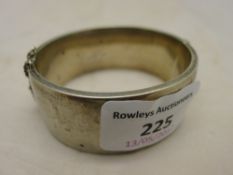 A heavy silver cuff bangle