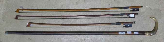 Three bows and a walking stick