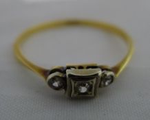 An 18 ct gold and diamond ring