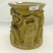 A Chinese carved wooden brush pot