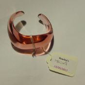 A Baccarat pink glass bangle