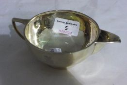 A silver cream jug