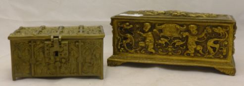 Two brass boxes