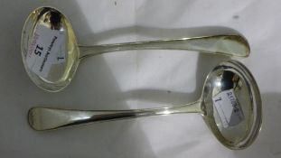 A pair of silver ladles