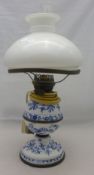 A converted Meissen porcelain oil lamp