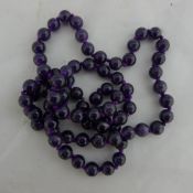 An amethyst bead necklace