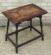 A Victorian carved oak side table